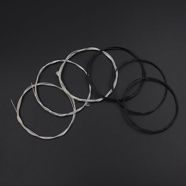Set (.028-.043) Classical Guitar Nylon Strings, Two-Color, Normal Tension. Includes 6 strings: 3 black nylon treble strings and 3 silver-plated copper wound bass strings. Designed for classical guitars with normal tension and high performance. Ideal for classical guitarists seeking reliable strings. String gauges: Trebles (.028, .032, .040), Bass (.030, .035, .043).