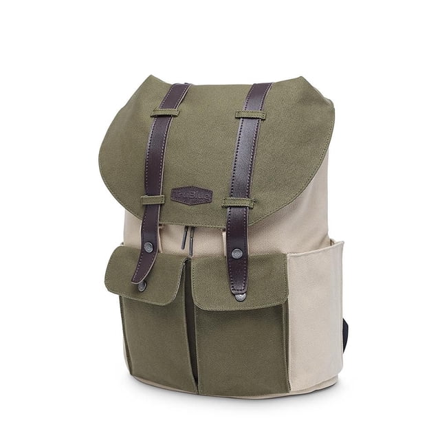 TruBlue The Pioneer Backpack 13" laptop, green and beige heavy-duty canvas with water-resistant treatment, brown leather straps with metal snap buttons, drawstring closure, two front pockets with inner dividers, side pockets, padded adjustable shoulder straps, and a hidden padded laptop compartment, suitable for school, travel, or daily use.
