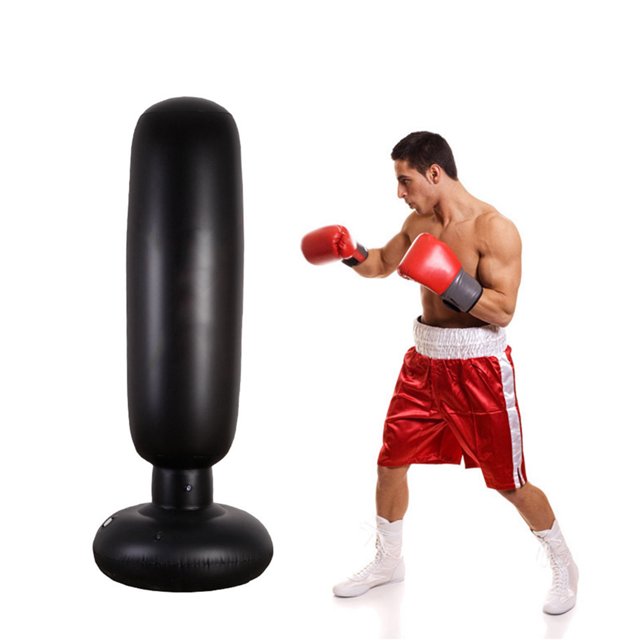 Bangcool Fitness Punching Bag Inflatable Heavy Punching Bag Boxing Target Bag for Children, crafted from durable black PVC material with a standing design. Ideal for boxing training, fitness, and stress relief, the bag measures 160cm (62.99in) in height and has a bottom diameter of 65cm (25.59in). A boxer in red shorts and gloves demonstrates its use.