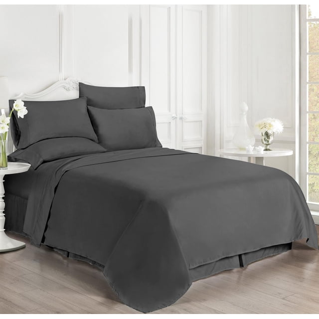 Microfiber Sheet Set with Bonus Pillowcases in grey on a made bed with a white ornate headboard, featuring smooth, wrinkle-resistant double-brushed microfiber fabric. The set includes fitted and flat sheets plus pillowcases, displayed in a bright bedroom with white paneled walls and light wood flooring, ideal for easy care and comfort.