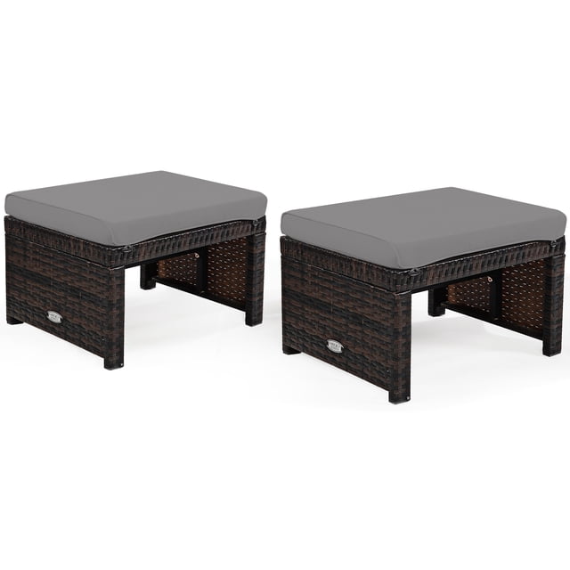 Patiojoy 2 PCS Outdoor Wicker Ottoman Patio Rattan Furniture Metal Footrest Seat Square Footstool with Cushion Gray. The set includes two square ottomans with mix brown PE rattan frames and gray cushions. Each ottoman features an X-shaped steel frame with reinforced crossbars for enhanced stability and a maximum weight capacity of 355 lbs. The cushions have hidden zippers for easy cleaning, and protective foot pads prevent scratches. Dimensions are 19.5 inches long, 15.5 inches wide, and 13 inches high. Suitable for outdoor and indoor use in patios, backyards, or poolside areas.