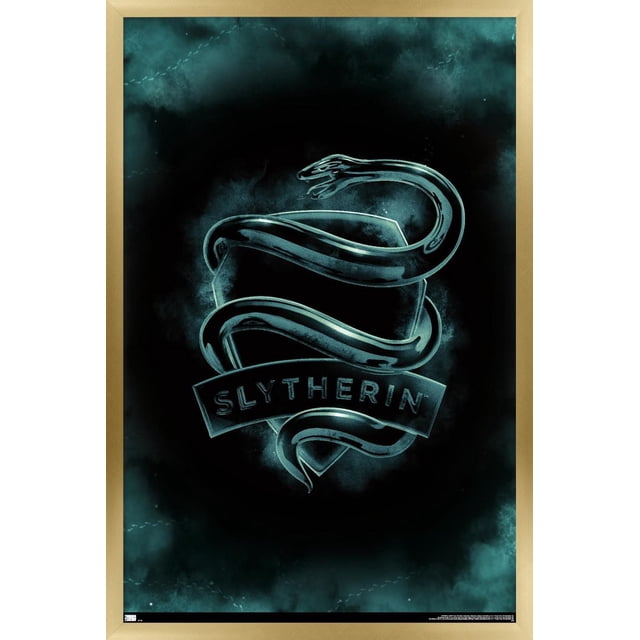 Harry Potter - Slytherin Crest Magic Wall Poster, 22.375" x 34" featuring a metallic green snake coiled around a shield with 'SLYTHERIN' on a banner, centered on a dark smoky teal background with a light wood frame, ideal for wall art, home décor, and themed party decoration.