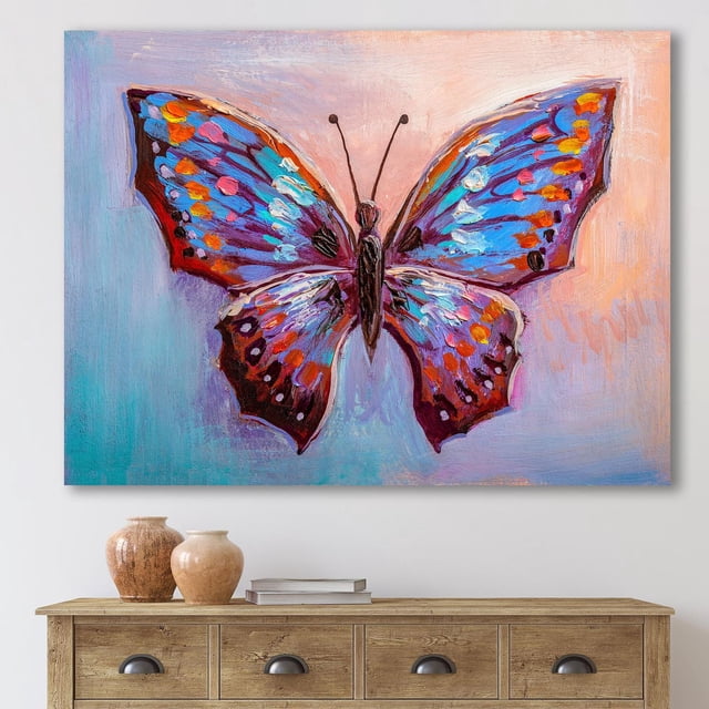 Designart Art Mural sur Toile Vintage Papillon Bleu II Représentant un Grand Papillon avec des Ailes Bleues, Violettes, orange et Rouges Vibrantes sur Toile de Coton de Qualité Supérieure, Enveloppé pour Galerie avec le design s'Étendant sur les Côtés, Prêt à Accrocher au-Dessus d'Une table console en Bois avec des vases Décoratifs et des Livres.