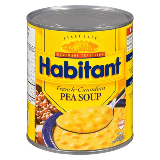 Habitant French Canadian Pea Soup in a yellow metal can showing a spoonful of creamy yellow pea soup with whole peas, ready-to-serve and made with quality Canadian peas, suitable for quick traditional meals.