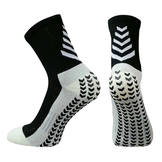 Agiferg Football Socks Anti-slip And Shock Absorption Sport Socks in a black and white design. The socks feature anti-slip grips on the sole and a cushioned structure for shock absorption. Made from cotton, they are designed for football players but also suitable for running, gym workouts, and other sports. Shown in a close-up view highlighting the textured sole and ankle support.