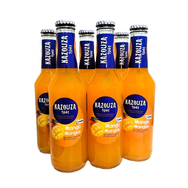Kazouza Sparkling Mango Flavored Drink 6x275ml bottles with bright orange liquid in clear glass, each featuring a blue label with white Kazouza 1941 branding and a mango image, ideal served cold and often used as a mixer in beverages.