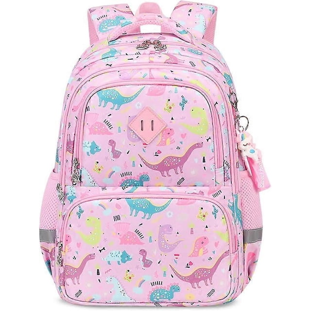 Kids Backpack Primary School Backpacks Middle School Kids Backpack Student Backpack Boys Backpacks Girls Backpack School Bag with Multi Pockets. This pink backpack features a vibrant dinosaur pattern with accents of rainbows and geometric shapes. It includes multiple compartments: a spacious main pocket for laptops or clothes, a secondary pocket for books and pens, a front pocket for small items like rulers, and side mesh pockets for water bottles or umbrellas. Designed with a water-repellent polyester exterior, reflective strips for visibility, and a chest buckle with an emergency whistle for added safety. The padded back panel and adjustable shoulder straps ensure comfort for children. Dimensions: 32 x 14 x 43 cm.