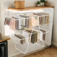 thumbnail image 4 of 2-Level Foldable Clothes Drying Rack with Height-Adjustable Wings, Free-Standing Laundry Rack Clothes Dryer, 33 Drying Rails, and Sock Clips, 4 of 7
