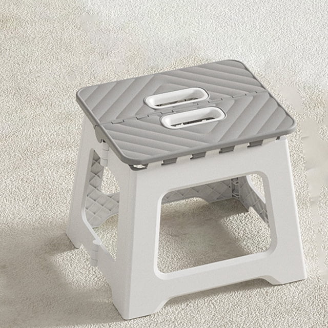 Folding Step Stool by EQWLJWE in grey, featuring a tall plastic single-level design with a foldable structure. The stool has a textured, anti-slip surface for enhanced stability and a built-in handle for portability. Suitable for use in kitchens, bathrooms, bedrooms, garages, and more. Compact and lightweight, ideal for both kids and adults.