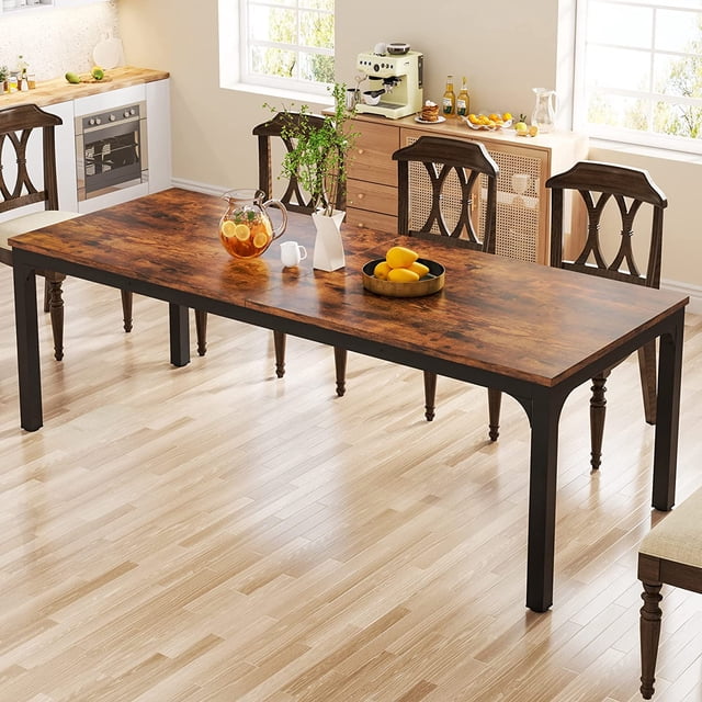 Tribesigns Table à Manger pour 6 à 8 Personnes, Table de Cuisine Rectangulaire de 78 Pouces de Long Présentée dans un Décor de Salle à Manger Lumineux. la Table Présente un Plateau Spacieux de 78,7 Pouces de Long et de 27,5 Pouces de Large en MDF Résistant aux Rayures et à l'Eau avec une Finition Effet Bois, Soutenue par un Cadre Métallique Noir Robuste. Idéale pour les Repas en Famille, les Soupers Ou comme Bureau Polyvalent Ou Table de Conférence.