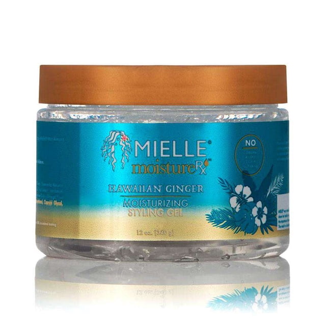 Mielle Organics Moisture RX Hawaiian Ginger Moisturizing Styling Gel, a 12 oz jar with clear gel and a golden lid. The label showcases a blue and gold design with floral accents, highlighting its non-flaking, alcohol-free formula for moisturizing and styling hair, ideal for curl definition and ponytails.