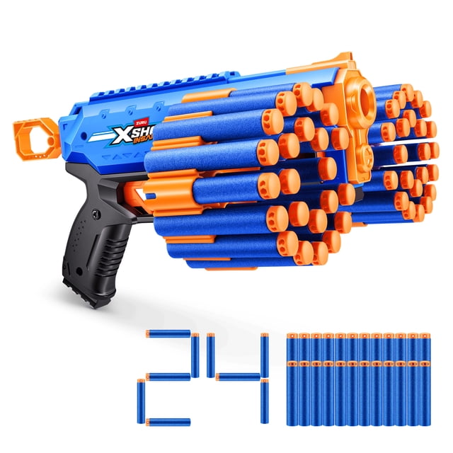 XSHOT Insanity Manic Blaster by ZURU with dual rotating barrels loaded with 24 blue foam darts with orange tips, black ergonomic grip, and blue and orange body, plus 24 extra foam darts arranged below, suitable for outdoor foam blaster play.