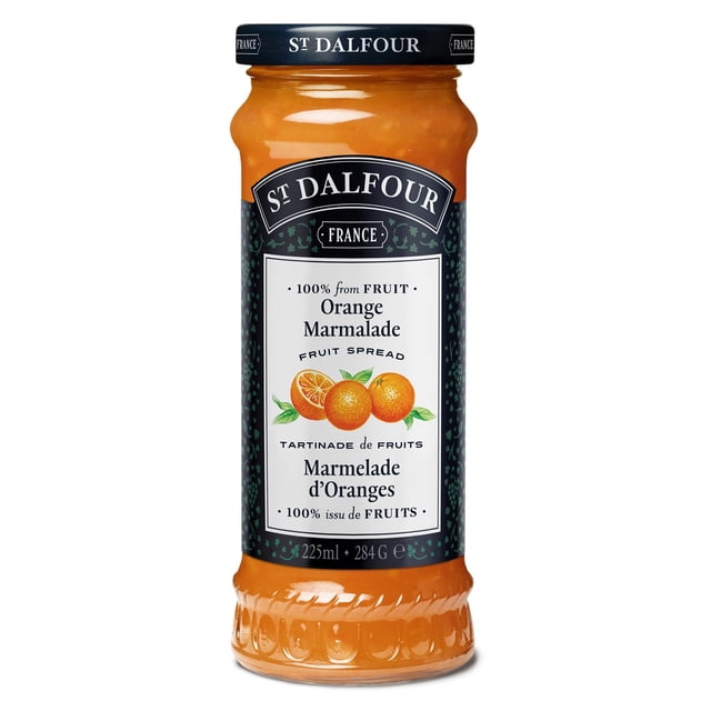 St Dalfour Orange Marmalade Spread in a 225ml glass jar with black lid, featuring a label with orange fruit illustrations and bilingual English-French text highlighting 100% fruit content and natural ingredients, ideal for spreading on toast or using in baking.