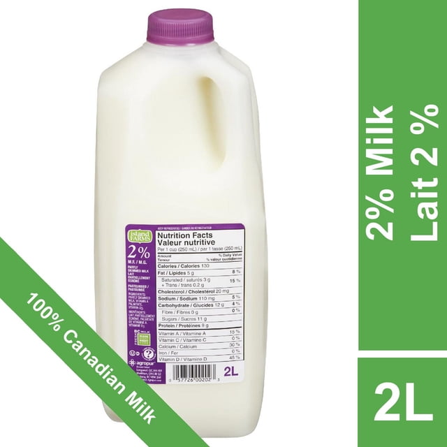 Island Farms 2% Partly Skimmed Milk in a 2L white plastic jug with a purple cap, featuring a nutrition facts label showing calories, fat, protein, vitamin D, and calcium, made from 100% Canadian dairy milk, suitable for drinking, cooking, and adding to coffee.