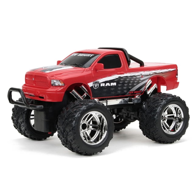New Bright Remote Control 1:16 RAM red RC truck with oversized black off-road tires and chrome rims, detailed grille and RAM logo decal on the side, full-function radio control for forward, reverse, left, and right driving with a simple game style transmitter, ready to run with batteries included, suitable for outdoor remote control vehicle play.