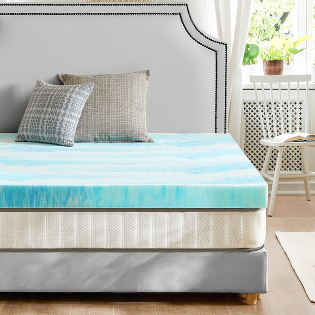 EDX King Size Memory Foam Mattress Topper, displayed on a bed with a grey upholstered headboard in a bright bedroom. The topper is 2 inches thick, made of cooling gel-infused foam with a blue and white marbled design, offering breathable comfort, pressure relief, and spinal alignment. Suitable for sleeper sofas, couches, RVs, and campers, it is CertiPUR-US certified for safety and durability, and ideal for refreshing old mattresses or softening firm surfaces.