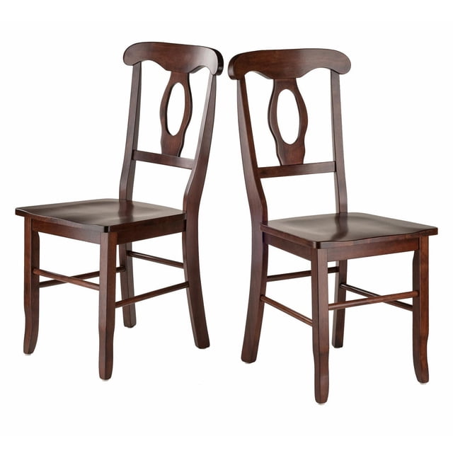 Winsome Renaissance 2 Piece Key Hole Back Chair Set with two solid wood dining chairs in walnut finish, featuring carved keyhole backs and contoured seats for comfort, measuring 36.6"H x 17.3"W x 21.1"D, ideal for kitchen or dining areas and often used as occasional seating.