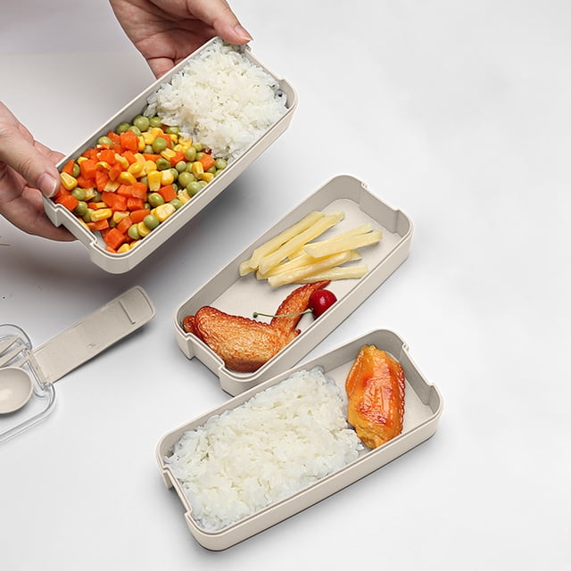 Yhmxh Kitchen Gadgets Kitchen Essentials Stackable Bento Box, a beige 3-in-1 compartment lunch box made of wheat straw material. The image shows three stackable containers filled with rice, vegetables, and other food items. Includes a spoon and fork, and features a leakproof design. Ideal for meal prep, picnics, and daily use. Microwave and dishwasher safe (except the lid).