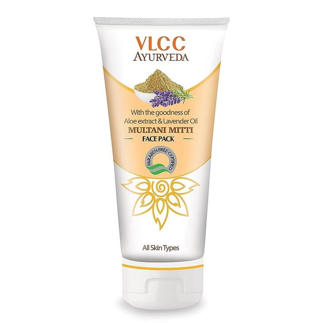 VLCC Ayurveda Multani Mitti Face Pack (100gm) in a white and gold tube featuring aloe extract and lavender oil. This facial mask is paraben-free and suitable for all skin types.