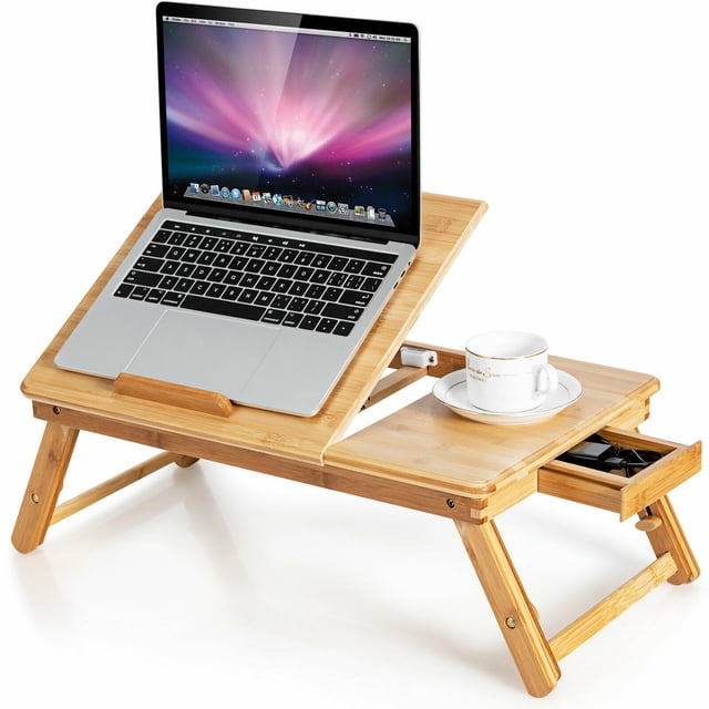 Gymax Bureau d'Ordinateur Portable en Bambou, Plateau de Lit Pliant Ajustable avec Tiroir et Dissipation de Chaleur. Doté d'Une Finition en Bambou Naturel, de Pattes Ajustables pour une Hauteur Allant de 8 Pieds' à 10,5 Pieds', et d'Un Dessus Inclinable avec 4 positions Inclinées pour une Vision Confortable. Comprend un Tiroir Latéral pour le Rangement, un Pare-Chocs Protecteur pour Empêcher le Glissement, et un design Ajouré en Forme d'Éventail pour la Dissipation de Chaleur. Convient aux Ordinateurs Portables, Livres et Petits Articles, avec un design Pliant pour un Rangement compact