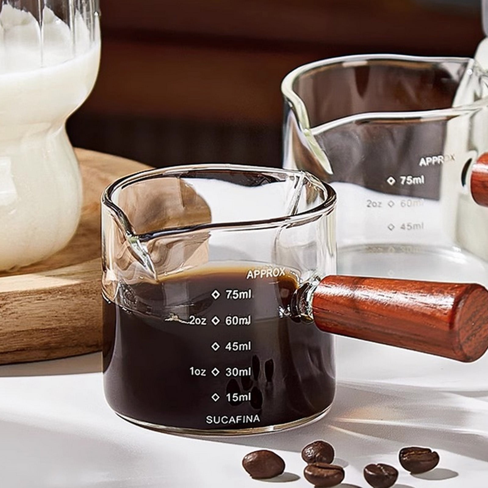 Tasse à Mesurer en Verre pour Espresso avec Échelle / Petit Pichet à Lait à Double Bec 100 ml en Verre Borosilicaté Sans Plomb, Poignée en Bois, Versement Facile, Mini Pichet Transparent