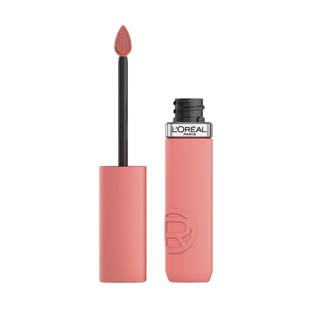 L'Oréal Paris Infallible Matte Resistance Liquid Lipstick, 5 mL, with the cap removed showing a teardrop-shaped sponge applicator coated in soft pink matte liquid. The rectangular matte pink tube features an embossed logo and a silver band with the L'Oréal Paris name near the opening.