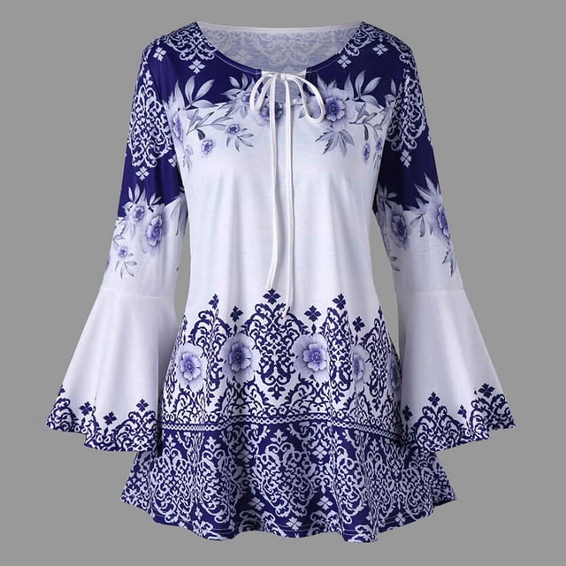 Leutsin Womens Plus Size Printed Flare Sleeve Keyhole T-Shirt with a white and navy floral print design. This plus size blouse features long flare sleeves, an O-neck with keyhole detail, and a flowy hemline. Made of soft polyester fabric, ideal for casual, daily, or outdoor wear.