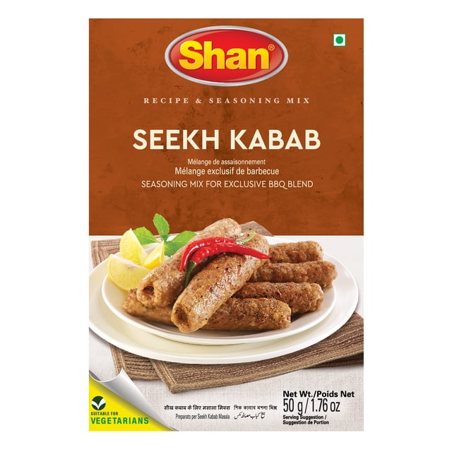 Shan Seekh Kabab Seasoning Mix 1.76 oz (50g) package with brown background and Shan logo, labeled as a BBQ seasoning mix. The front displays a white plate of grilled seekh kababs garnished with red chili, lemon wedges, and mint on a woven mat. Suitable for vegetarians, net weight shown.
