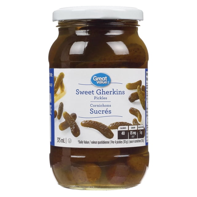 Great Value Sweet Gherkins Pickles in a 375 mL clear glass jar with a white lid, containing small whole pickled cucumbers in brine, labeled with the Great Value logo and bilingual English-French text, suitable as a pantry condiment or topping.