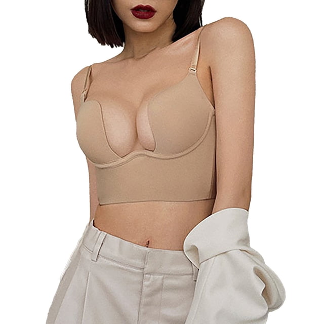 2025 Women Solid Low Back Bras Pack featuring a beige underwired U-shape backless bra with adjustable straps. The bra is designed for everyday wear, offering support and comfort with a convertible strap design. Made of durable nylon material, it is suitable for all seasons and occasions. The model showcases the bra paired with high-waisted trousers and a draped jacket.