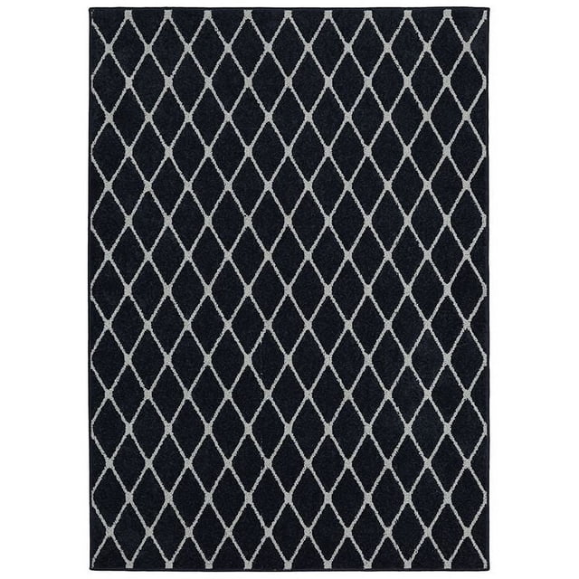 Hometrends Brussels Blue Polyester Area Rug with a geometric diamond lattice pattern in light grey on deep blue, densely tufted with stain-resistant synthetic yarn, suitable for living rooms, bedrooms, and offices.