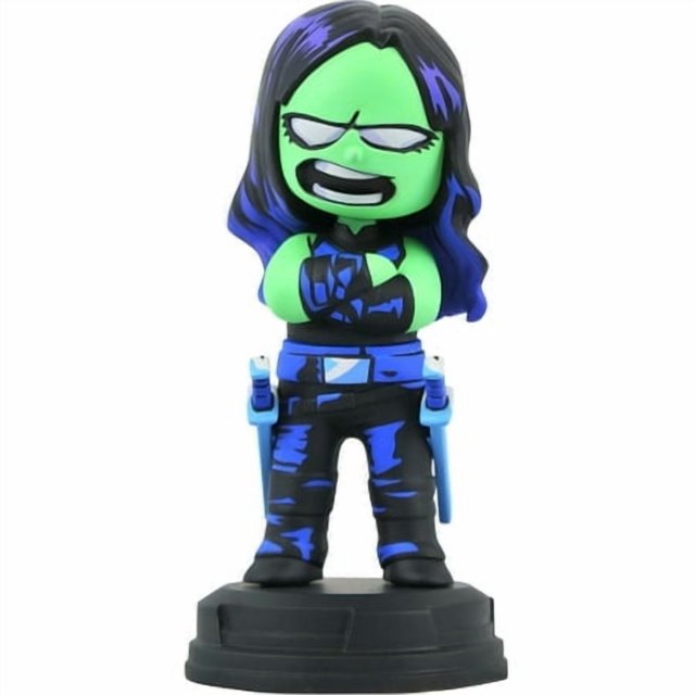 Diamond Select Toys Marvel Animated Series: Gamora Statue, Multicolor. A collectible 5-inch tall vinyl figure featuring Gamora with a green face, purple hair, and detailed sculpting inspired by Skottie Young's variant cover artwork. The statue stands on a black base and includes vibrant paint applications. Packaged in a full-color window box with a certificate of authenticity.