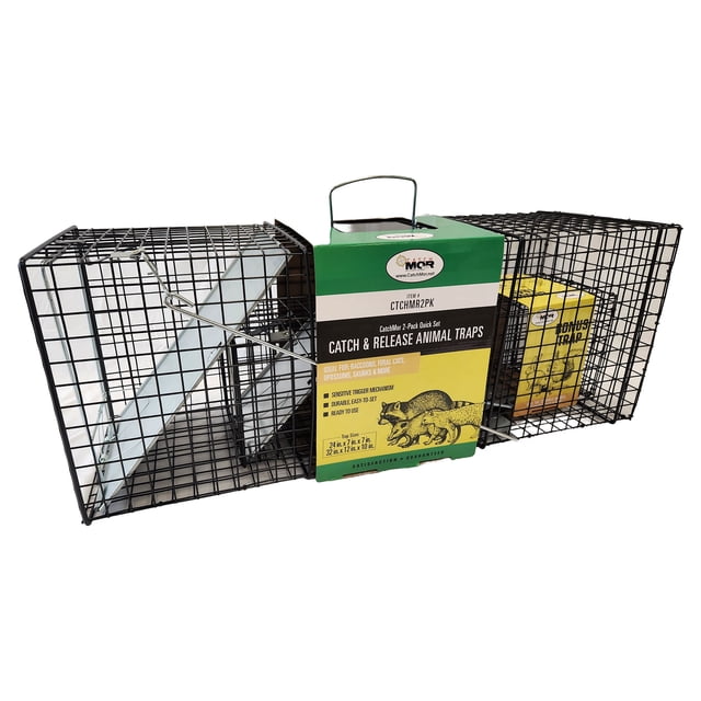 Rugged Ranch CatchMor Live Animal Multi Catch 2 Pack Trap featuring one large and one small black powder-coated metal trap. The traps are designed for humane wildlife capture, suitable for raccoons, opossums, cats, bunnies, and squirrels. The large trap measures 32 x 12 x 10 inches, while the small trap measures 24 x 7 x 7 inches. Both traps include spring-loaded doors for secure capture and easy relocation. The product is displayed with its packaging, highlighting its catch-and-release functionality.