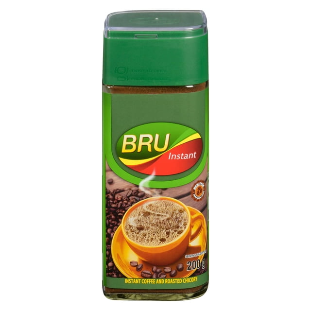 BRU INSTANT COFFEE 200 g dans un Pot en Verre Transparent avec Couvercle en Plastique Vert, Présentant le logo BRU et une Étiquette Montrant une Tasse de Café Jaune à la Vapeur sur une Soucoupe avec des Grains de Café, Fait d'Un Mélange de Grains d'Arabica et de Robusta Torréfiés à la perfection, Idéal pour une Préparation de Café Rapide.