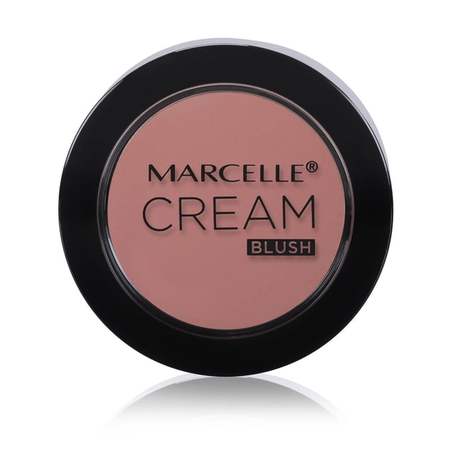 Fard à Joues Crème - Fard à Joues Nude par Marcelle, un compact Rond avec un Bord Noir et un Couvercle Transparent Montrant un Fard à Joues Rose Nude Crémeux à l'Intérieur, Conçu pour une Finition Naturelle et Légère Enrichie en Vitamine C pour l'Éclaircissement, Convient à Tous les types de Peau et Est Souvent Utilisé pour une Teinte à Lèvres Subtile.