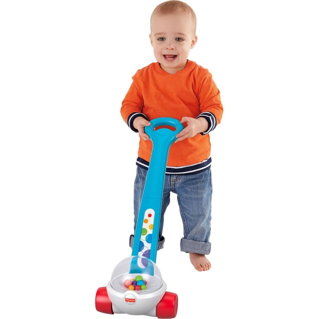 Fisher-Price Jouet Poussoir de Maïs avec Action de Pompage de Balles pour Nourrissons et Tout-Petits, Montré avec un Tout-Petit Tenant Sa Poignée Bleue Décorée de Cercles Colorés, Présentant une base Blanche avec des Roues Rouges et un Dôme Transparent Contenant des Balles Multicolores Qui Éclatent au Fur et à Mesure Que le Jouet Est Poussé, Conçu pour Encourager la Marche et Développer la Motricité Globale pour les Enfants de 12 Mois et Plus.