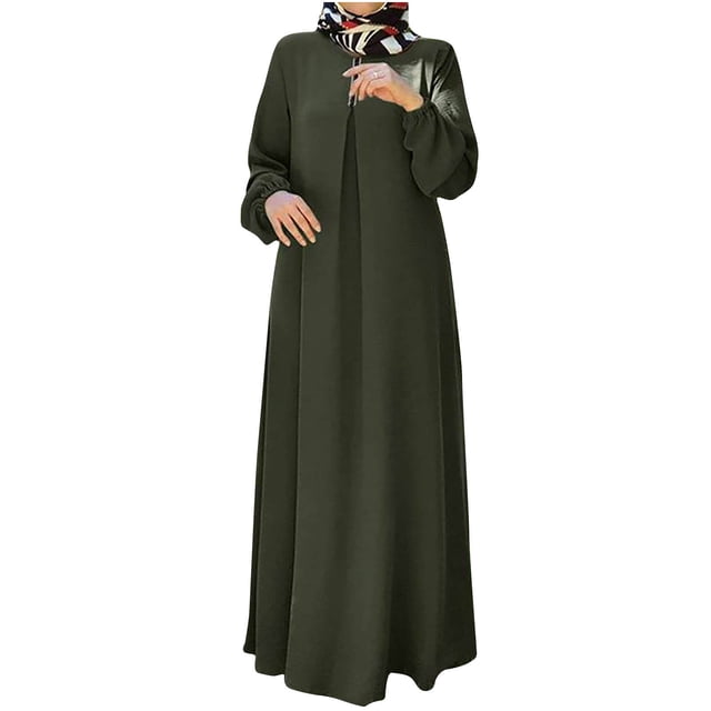 Robe Abaya pour Femmes Musulmanes à Manches Longues, Robe Islamique avec Poches, Maxi Tenue de Prière Élégante, Longue Robe de Fête par Ctreela. Cette Abaya Pleine Longueur Présente un design Modeste avec des Manches Longues et une Coupe Ample pour des Mouvements Confortables. Fabriquée à Partir d'Un Tissu Respirant de Haute Qualité, Elle Convient aux occasions comme le Ramadan, l'Aïd, les Mariages et les Événements Formels. la Robe Est Présentée dans une Couleur Unie Vert Foncé avec un Détail Plissé à l'Avant et des Poignets Élastiqués,