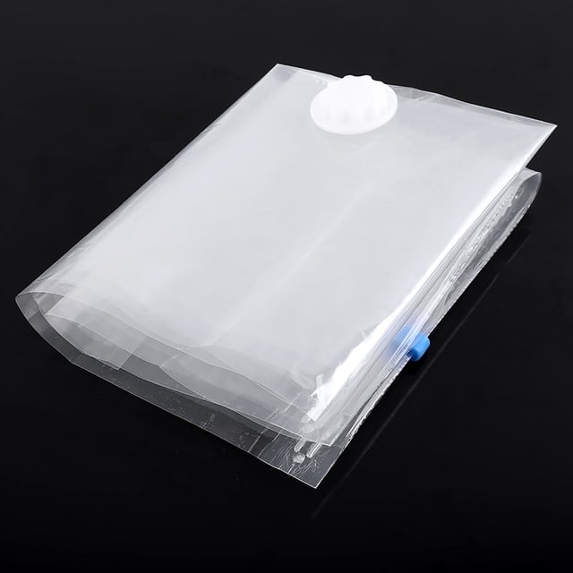 Vacuum Storage Bag Space Saver Bags Vacuum Organizer Large Vacuum Storage Bags Practical Large Vacuum Compressed Storage Bags Organizer Household Space Saver, measuring 60 x 80 cm. The transparent bag is made of high-quality PET and PE material, featuring a zipper and sealing valve for airtight storage. Ideal for storing clothes, duvets, towels, blankets, or pillows, it helps save space in closets or luggage. The bag is reusable, environmentally friendly, and protects items from dust, moisture, and microorganisms.