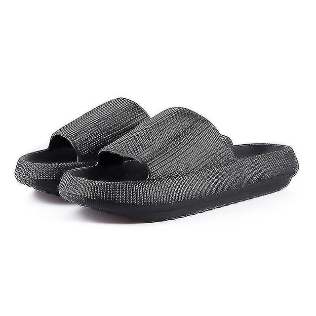 Pillow Sliders Sandals Extra Ultra-soft Cloud Slippers Shoes in solid black with textured EVA material. Features a thickened elastic sole approximately 4cm thick for comfort, shock absorption, and wear resistance. Anti-slip sole and upper texture enhance grip and stability, suitable for indoor and courtyard use. Lightweight, foldable design with ventilation for added comfort.