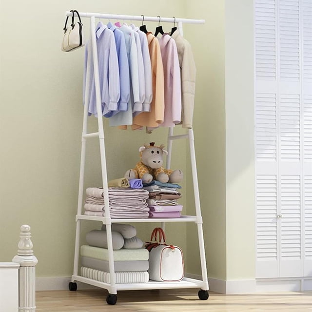 SUSUZI 63" Rolling Garment Rack with Wheels, 2 Storage Shelves, 66LBS Capacity Metal Coat Rack for Bedroom Cloakroom Laundry Room (White) Front-facing 3-tier metal rack (22"L x 16.5"D x 63"H) with a top hanging rod, two white non-woven shelves, triangular anti-tip base and powder-coated iron frame. Four 360° swivel wheels (two lockable) for mobility; space-saving clothing organizer suitable as a temporary open closet or staging rack.