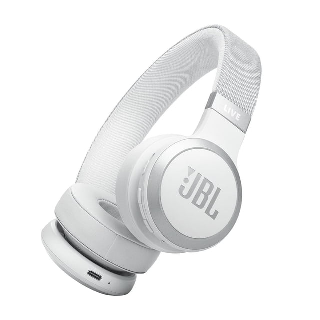 JBL LIVE 670NC on-ear headphones in white with cushioned ear cups and fabric headband, featuring JBL logo and side control buttons, equipped with true adaptive noise cancelling and Bluetooth connectivity, shown at a 3/4 angle on a white background, suitable for immersive music listening and hands-free calls.