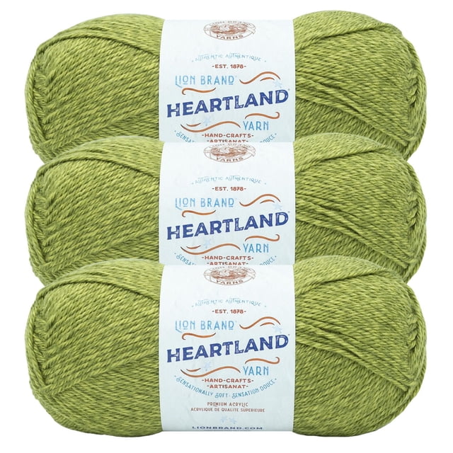 Lion Brand Yarn Heartland Yarn 3Pack in light green, three skeins of worsted weight acrylic yarn with white labels featuring brand and product details in blue and orange text, stacked horizontally on a white background, suitable for knitting, crochet, and crafting projects.