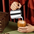 thumbnail image 1 of SuoKom Milk Frother - Milk Frother Cup with Clear Graduation - 304 Stainless Steel Cappuccino Maker Accessories- Milk Carafe Cup with Insulated Handle, 1 of 7