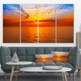 thumbnail image 1 of Lever de Soleil sur Mer Orange sous Ciel Bleu - Grande Impression sur Toile, 1 of 3