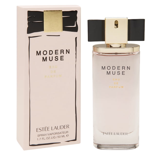 A pack of 3 Modern Muse by Estee Lauder Eau De Parfum Spray, 1.7 oz bottles. The image shows a sleek rectangular glass bottle with a light pink liquid and gold accents, topped with a black bow-shaped cap. The packaging box is light pink with black and gold detailing, featuring the Modern Muse branding.