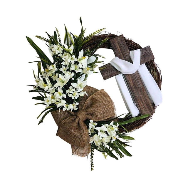 Couronne de Porte Ronde de Pâques avec une Croix en Bois Rustique Ornée d'Un Drapé en Tissu Blanc, Entourée de Feuilles Vertes Luxuriantes et d'Accent Floraux Blancs. la Couronne Comprend un Nœud en Jute pour une Touche Rustique, Idéale pour la Porte d'Entrée Ou la Déco de la Maison.