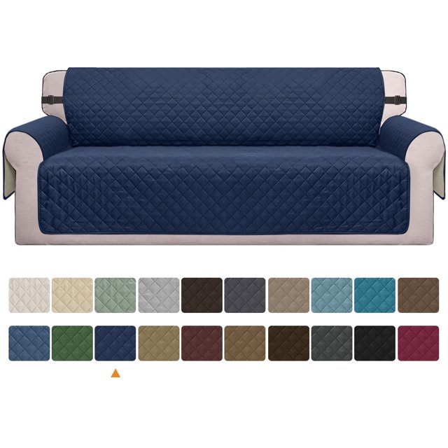 Housse de sofa Réversible par Visaccy, Montrée dans un design Matelassé Bleu Marine, Drapée sur un Canapé beige. Ce Protecteur de Meuble Résistant à l'Eau et Antidérapant Est Idéal pour les Maisons avec des Animaux de Compagnie, des Enfants Ou des Déversements Fréquents. la Housse Présente des Sangles Élastiques pour un placement Sécurisé et Est Lavable à la machine pour un Entretien Facile. Offerte en 14 Couleurs et Plusieurs Tailles, Y Compris des options pour des sofas Surdimensionnés. la Conception Réversible Offre une Polyvalence pour les Changements Saisonniers Ou les Mises à Jour de Déco