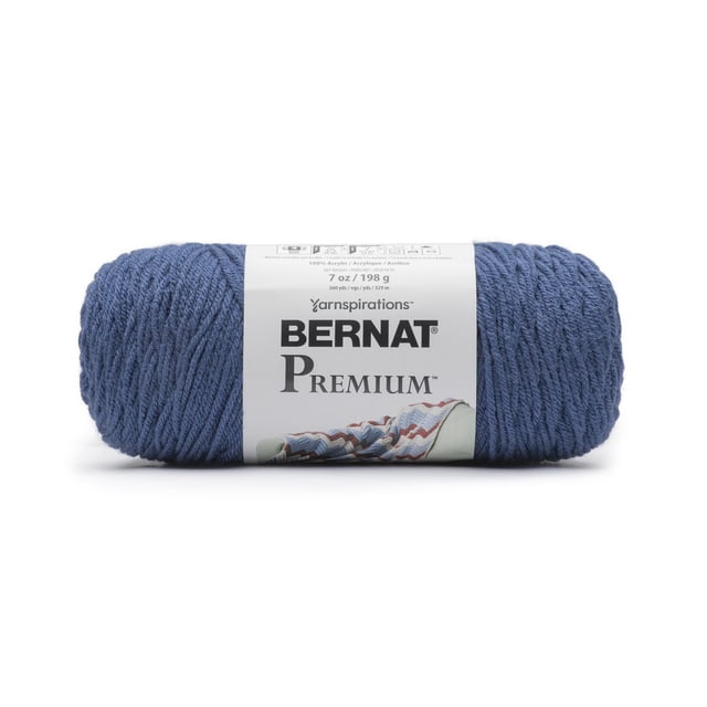Bernat® Premium TM Fil, Acrylique #4 Poids Moyen, 7oz/198g et 360 yards, Couleur Bleu Foncé avec une Étiquette Blanche Montrant le logo Bernat Premium et une image Tricotée Afghane, Convient aux Projets de Tricot et de crochet Incluant des Vêtements et la Déco Maison.