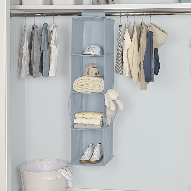 Neatfreak Kids 4-Cubby Hanging Organizer in light blue breathable fabric with four reinforced shelves and two mesh side pockets, hanging from a closet rod with a wide Velcro sleeve, storing children's folded clothes, shoes, toys, and blankets, ideal for maximizing closet space and keeping it clutter-free.