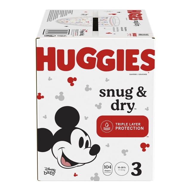 Huggies Snug & Dry Couches Giga Pack Boîte avec Motif Disney Mickey Mouse, Taille 3 pour Bébés 16-28 lb (7-13 kg), Mettant en Valeur la protection à triple Couche et 104 Couches Compte sur Emballage Blanc avec Texte Rouge et Noir.
